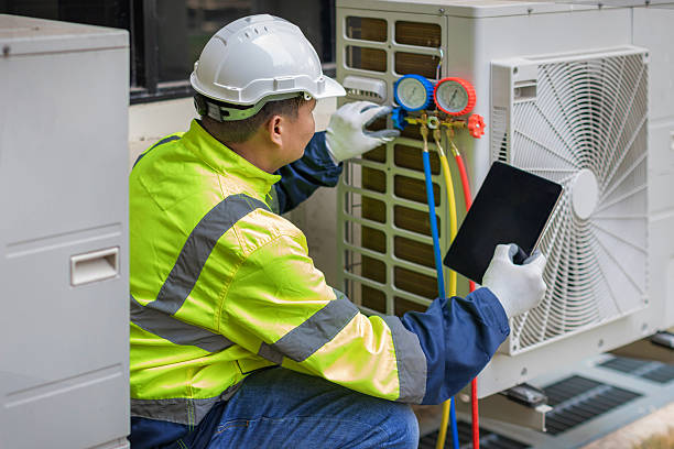 Professional Heat Pump Repair technician working in Tecumseh, OK